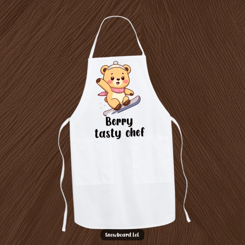 Funny bear cub apron, depicted doing a snowboard trick with playful determination, ideal for kitchen apparel and winter sports fans.